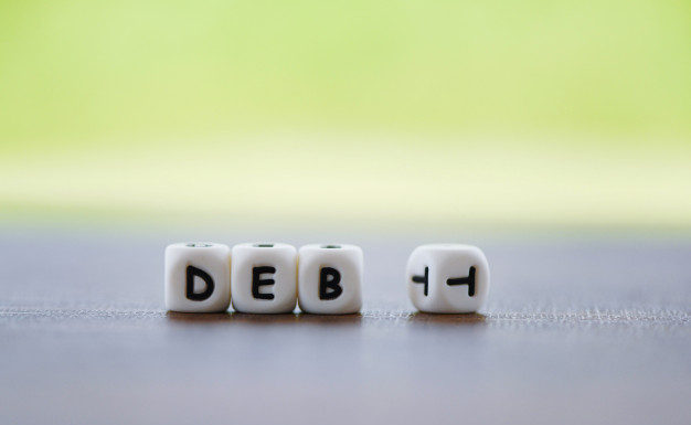 Is buying a house with debt a smart decision?